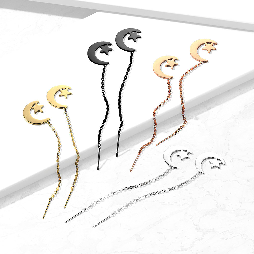 Set of moon and star earrings in gold, black, and rose gold on a white background