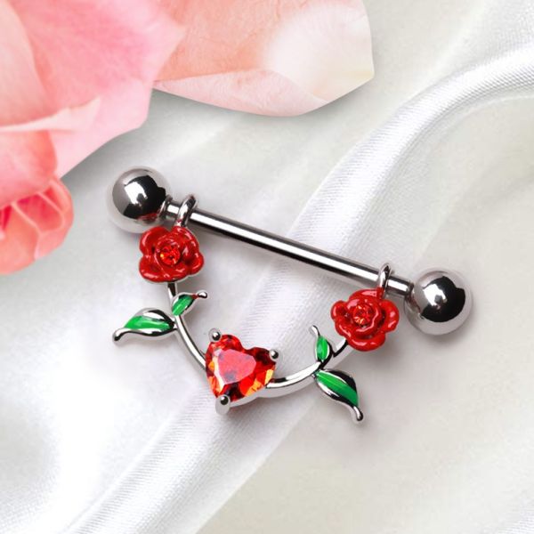 Heart and Roses Nipple Dangle – 316L Stainless Steel Red Enamel Roses with Heart CZ and Green Leaf Detail on a white surface with pink flowers.