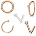Set of rose gold nose rings on a white background
