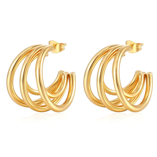 Gold hoop earrings on a white background