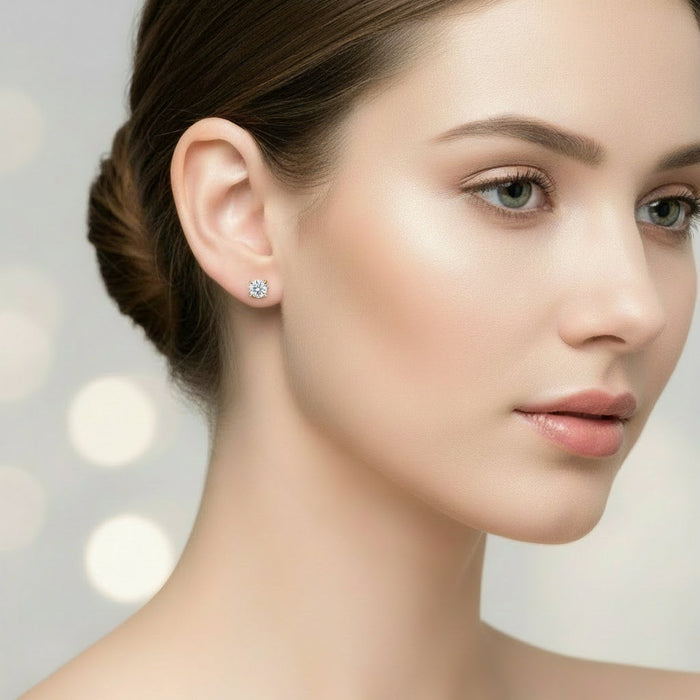 Close-up of a woman wearing a diamond earring with a blurred background