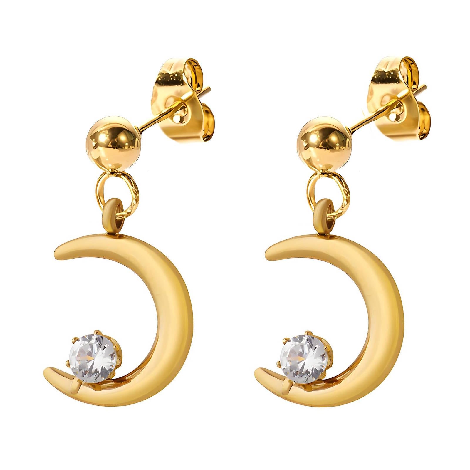 Gold earrings with moon designs and clear stones on a white background