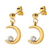 Gold earrings with moon designs and clear stones on a white background