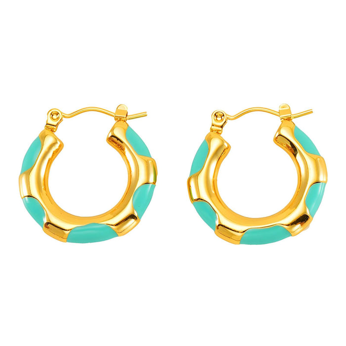 Gold hoop earrings with turquoise enamel on a white background