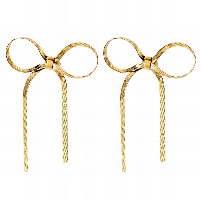 Pair of gold bow-shaped earrings on a white background