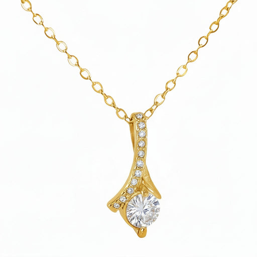 Gold necklace with a pendant on a white background