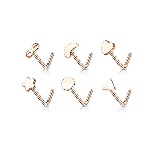 Set of rose gold nose rings with various shapes on a white background