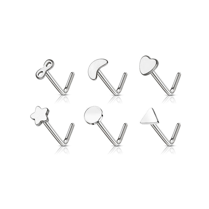 Set of silver nose rings with various shapes on a white background