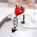 Devil Heart Top Drop Belly Bar on glass display