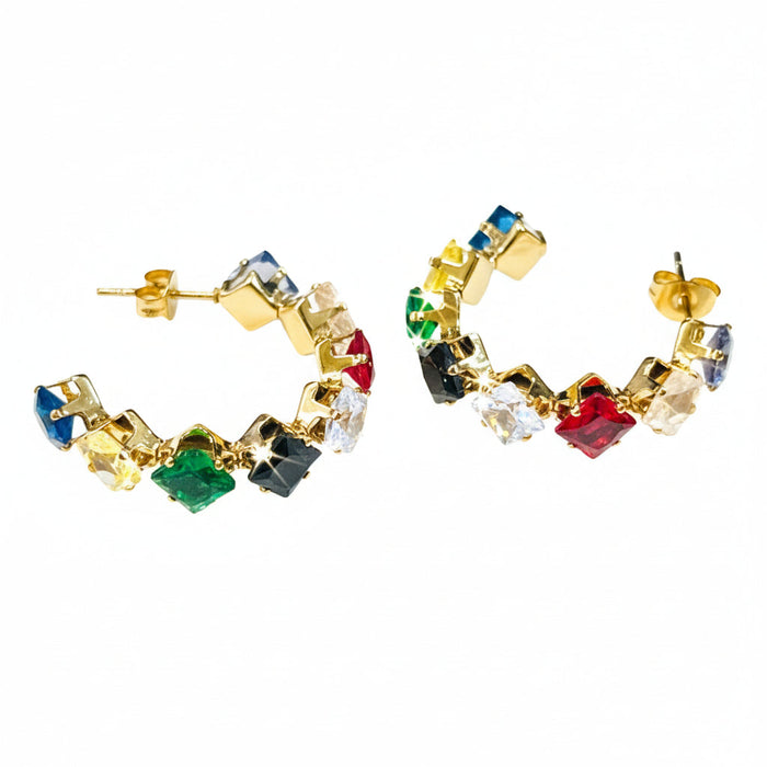 Colorful hoop earrings with gold frame on a white background